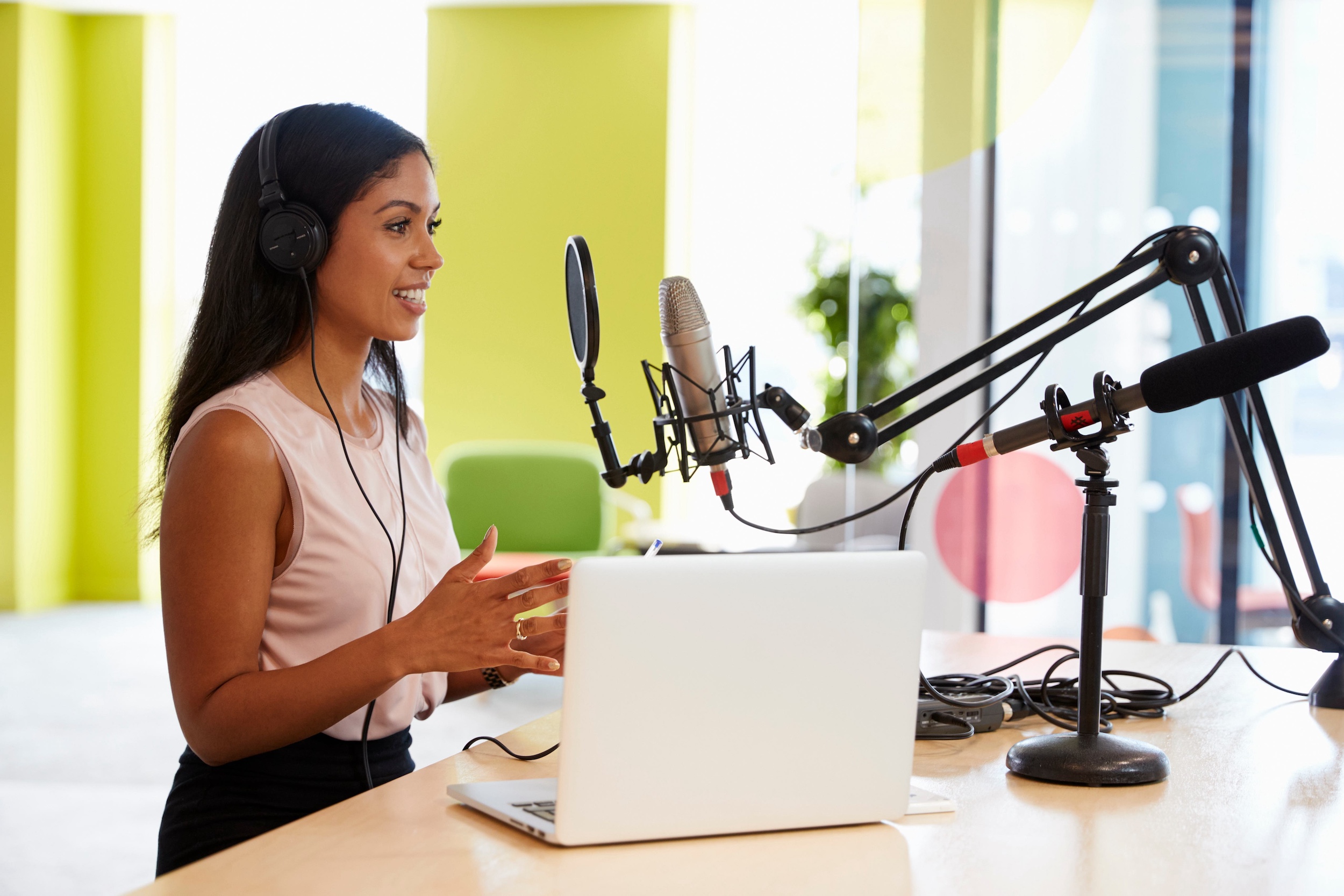 Woman speaking into microphone